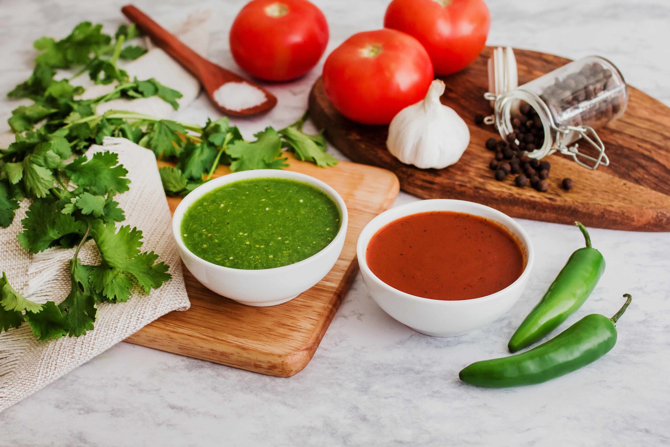 Red and green types of hot sauces.